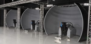 Semi-dome grey coloured simulators at ITTC Tactical Training Centre in London, Ontario