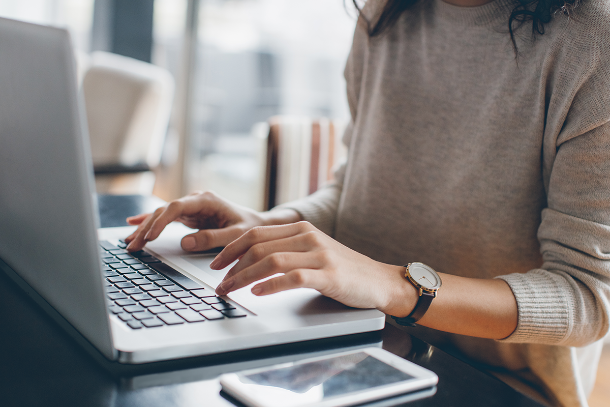Bookkeeping-LG Woman's Hands Typing on a Computer