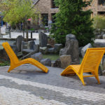 Yellow 720 Chaise Lounge on walkway in Whistler
