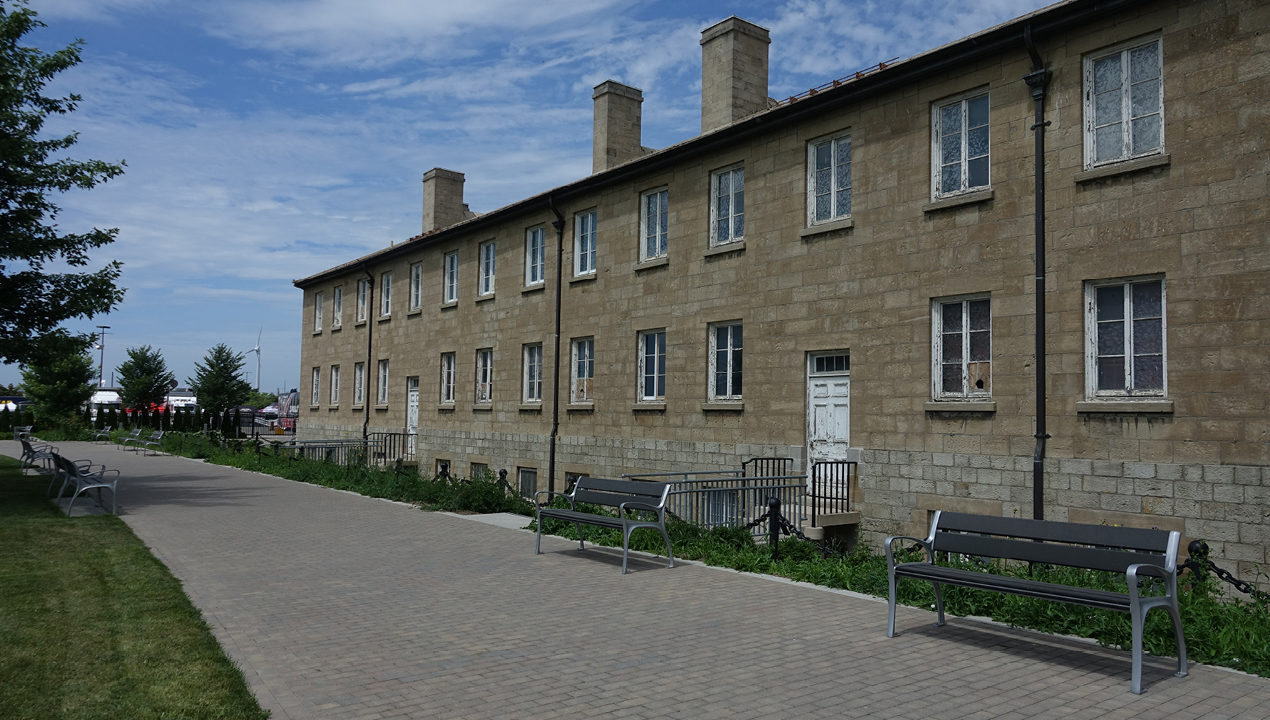 mbe-0870-series_hdpc-charcoal Benches outside an old building