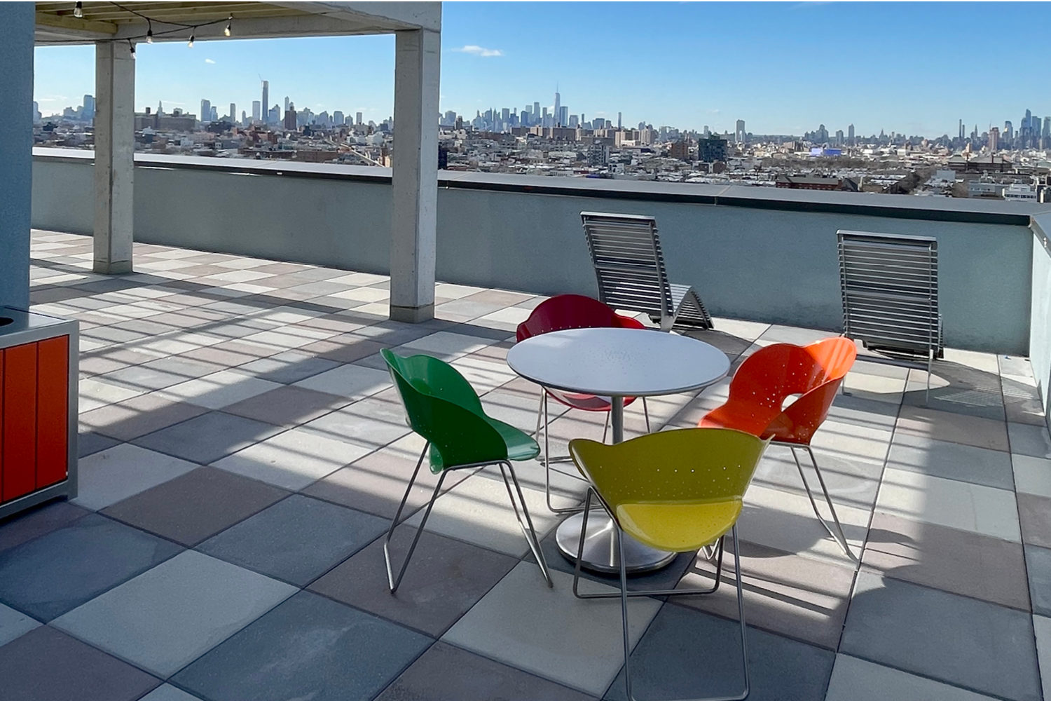 Battery Table and Chairs brightly painted on roof-top