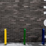 Brightly painted Iconic Bike Racks in front of LOVE wall
