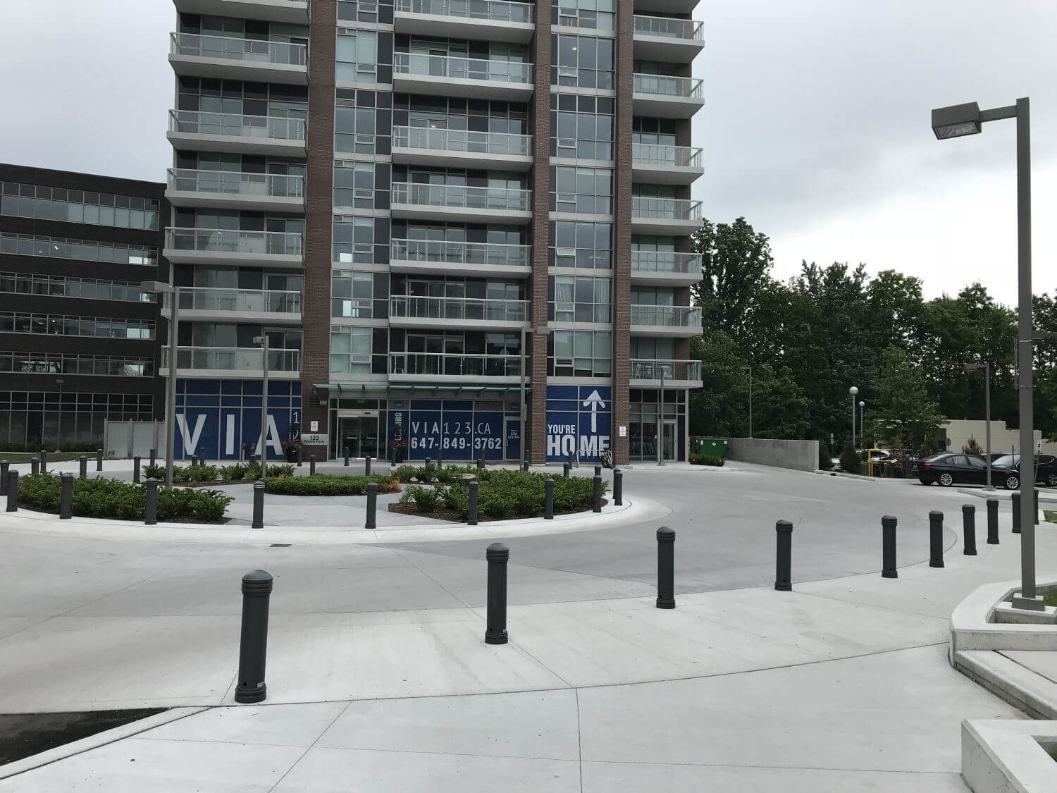 650 Bollards surrounding VIA apartments