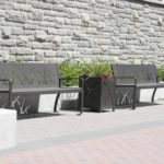 970 Benches and 400 Planters against stone wall