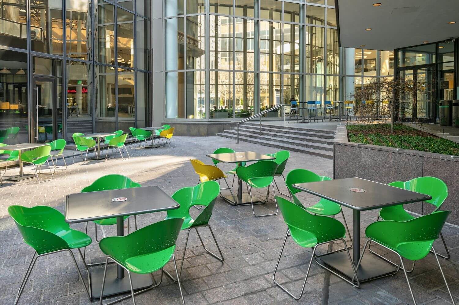 Green chairs and silver tables