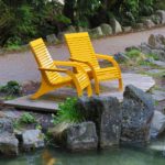 Two yellow chairs on patio