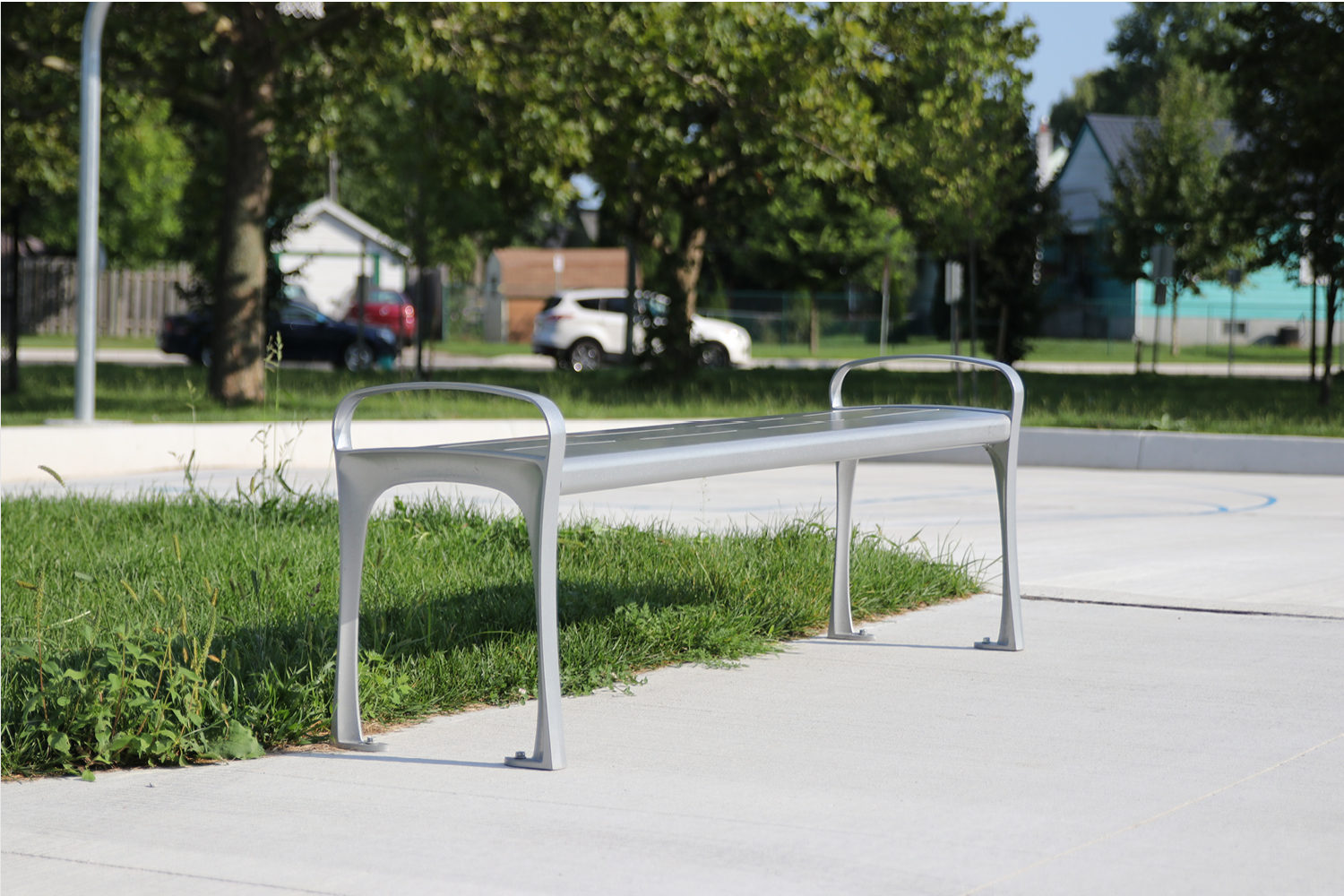 870 Backless Metal Bench in park setting
