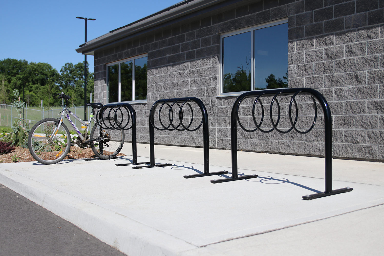MBR-0300 Bike Racks with bike in front of building