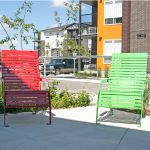 Red and Green powdercoated 720 chairs at apartment complex