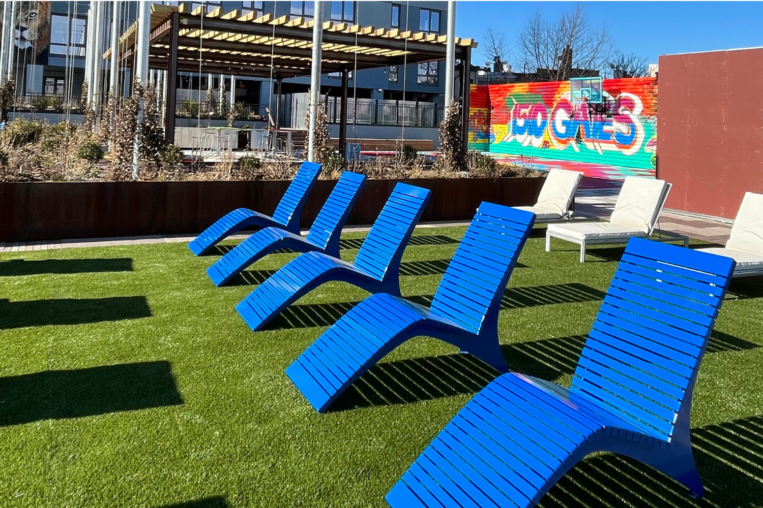 720 Chairs powdercoated blue on lawn