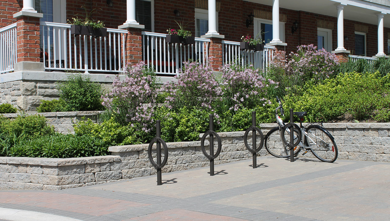 Black Direct Burial Bike Rack outside of Residential Area