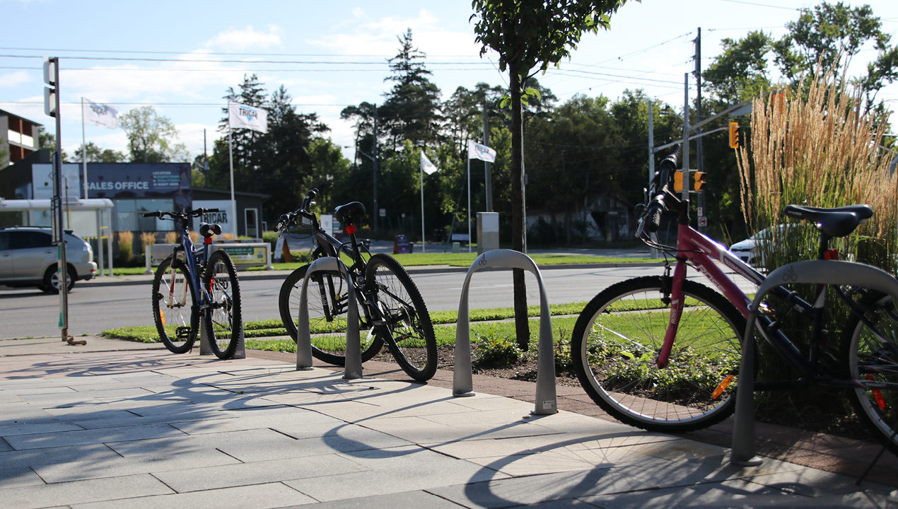 Bike Rack/Posts with Bikes near commercial area