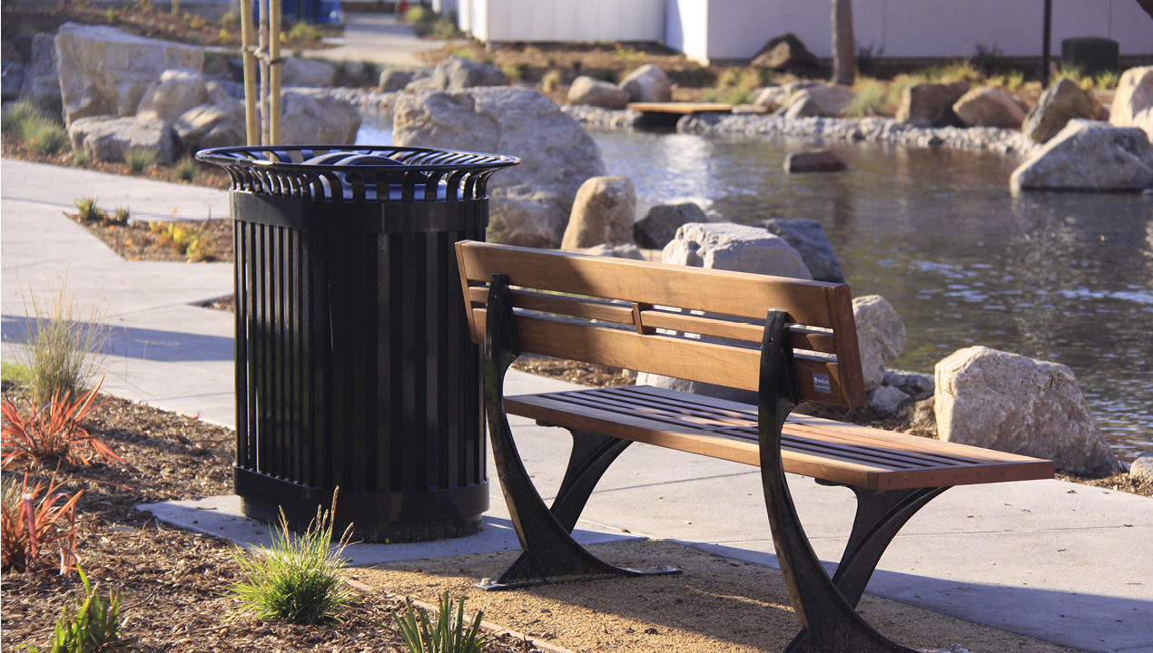 Bench and Trash Can Near River
