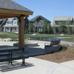 Picnic tables, Benches and Trash Can outside Subdivision