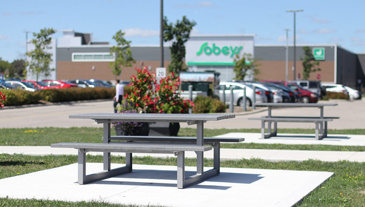 Grey Picnic Table outside Sobeys