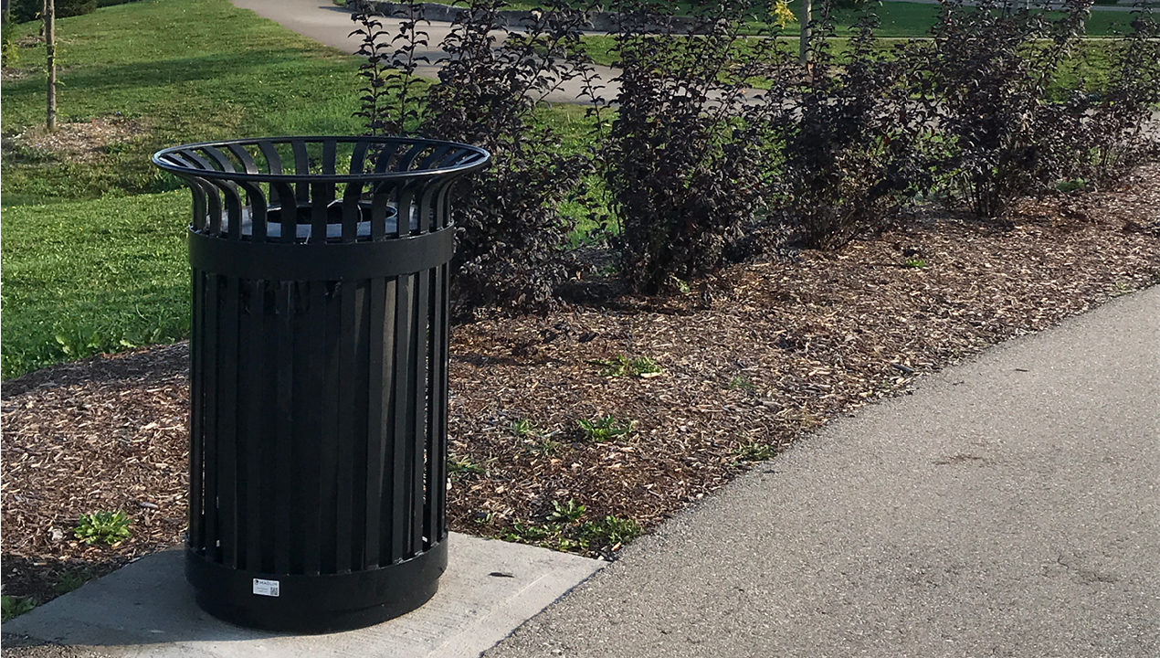 Black Trash Can Near Gardens