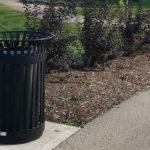 Black Trash Can Near Gardens