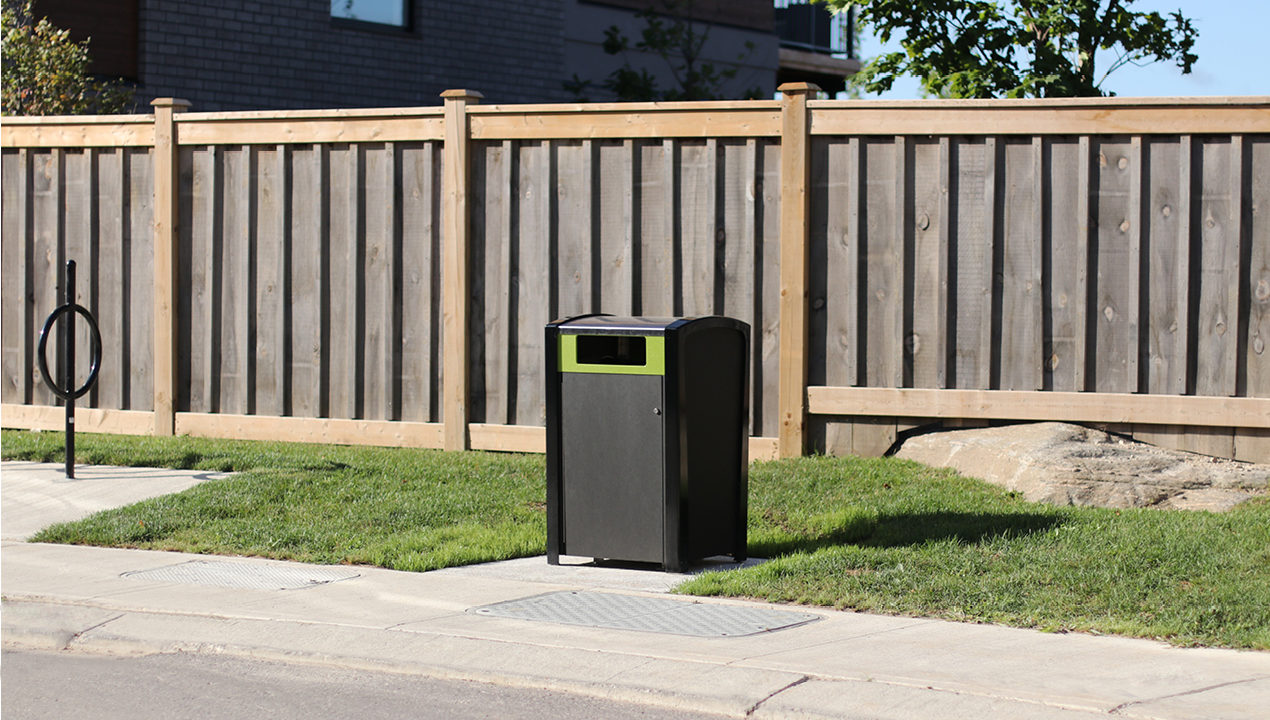 Trash Can Near Wood Fence