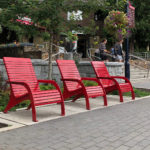 Three red 720 Whistler Chairs