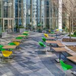 Bank of America Plaza with Brightly powdercoated Battery Chairs and Foro Wood Tables