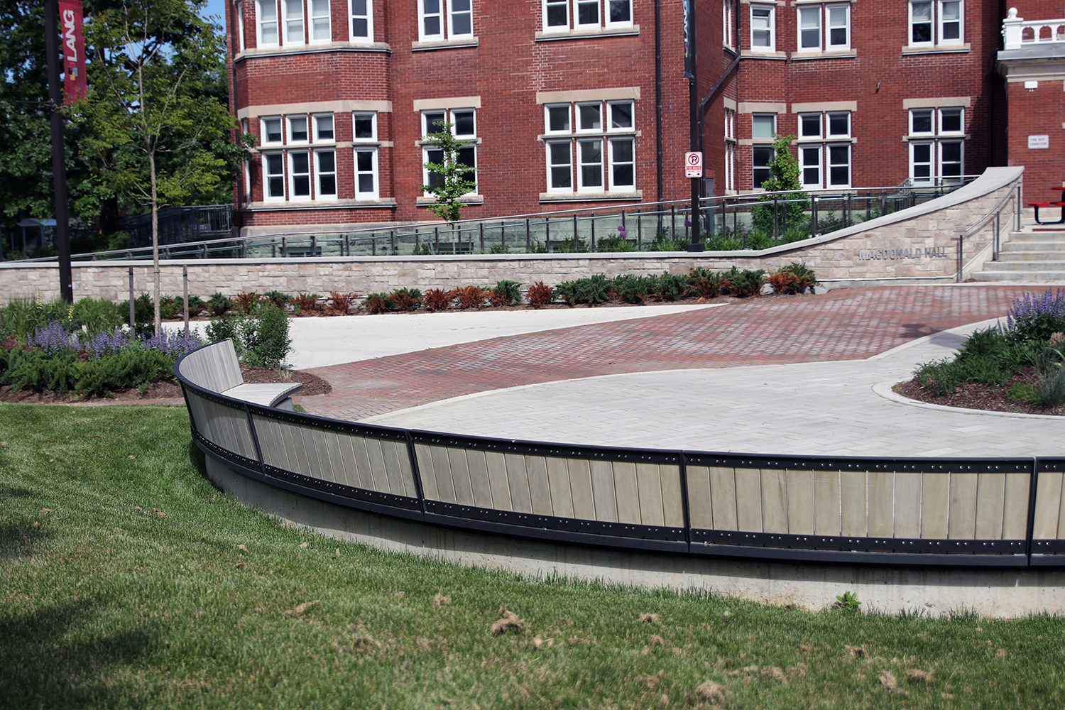 Curved Ogden Bench with custom wood at Lang Plaza
