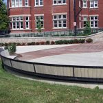 Curved Ogden Bench with custom wood at Lang Plaza