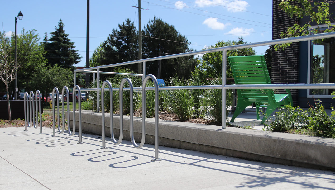 MBR-0400 Bike Racks lined up in front of a townhome complex