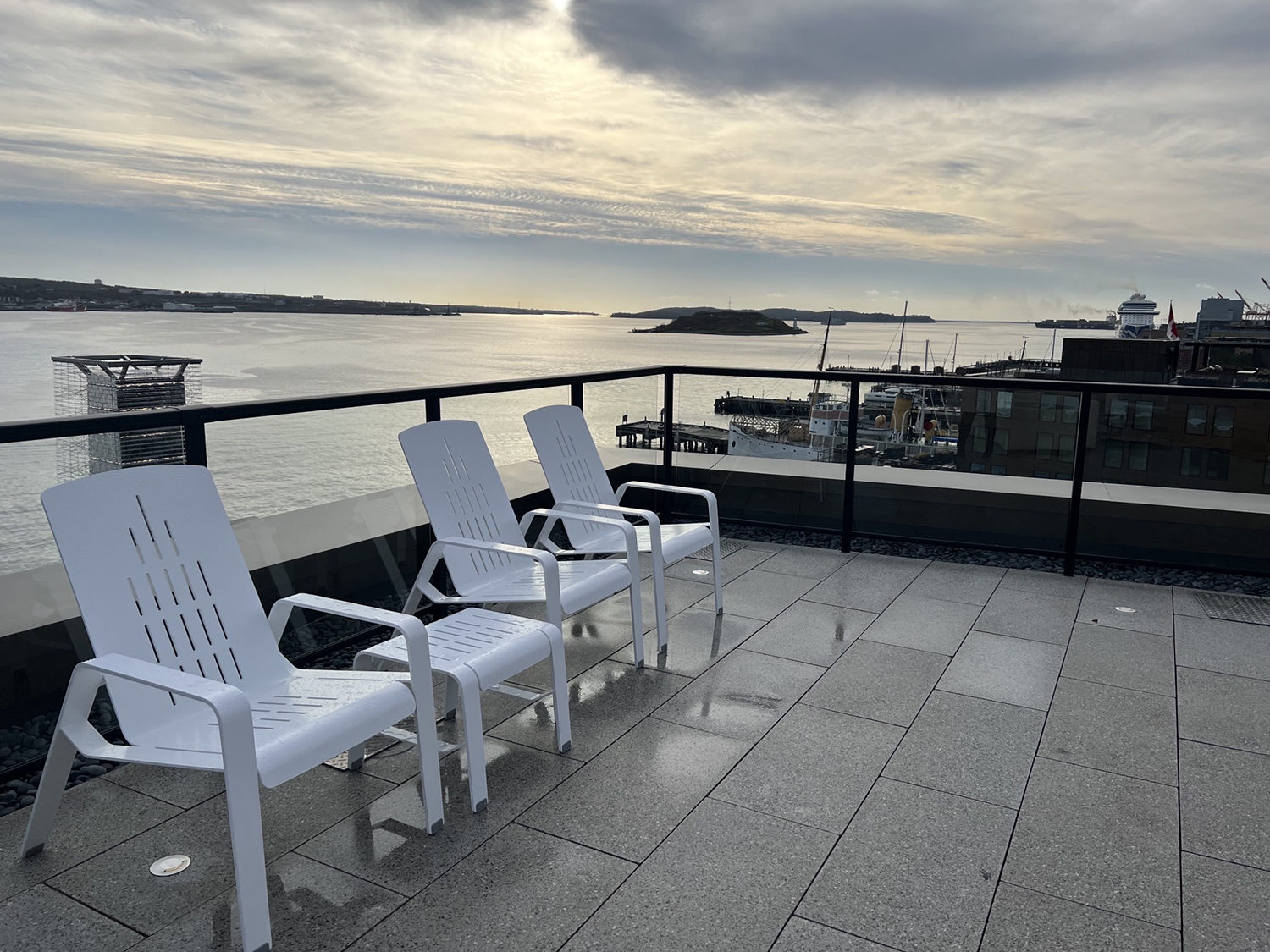 ALUM lounge chairs and table on rooftop patio