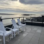 ALUM lounge chairs and table on rooftop patio