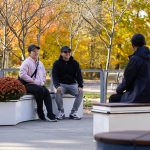 Fall day with people sitting on CANOE modular planters