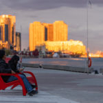 People enjoying the sunset at Bathurst Quay Commons while sitting in Maglin 720 Chairs