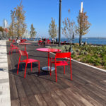 Maglin Foro tables and chairs at Bathurst Quay Commons on sunny day next to lake