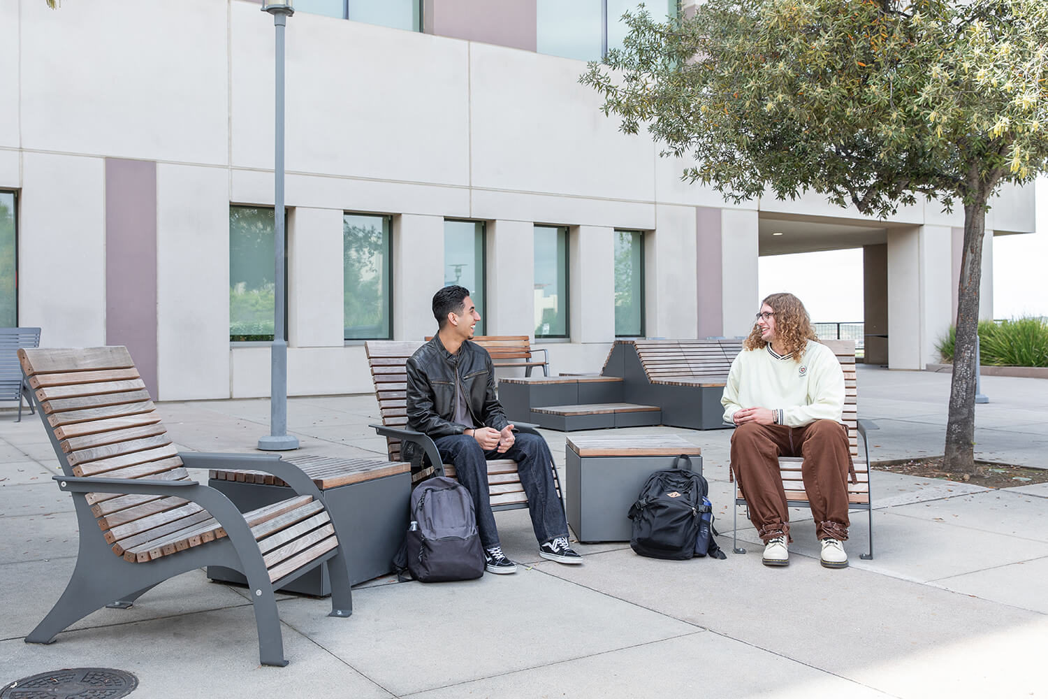 Students enjoying the outdoors while sitting on Maglin 720 chairs at CSUSM