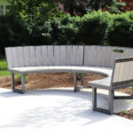 Curved Ogden bench with custom accoya wood at the University of Guelph's Lang Plaza
