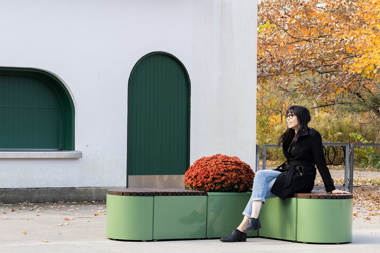Maglin Pixel collection rounded tall blocks with women sitting, white and green building in background