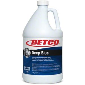 Gallon container of BETCO DEEP BLUE RTU WINDOW & GLASS CLEANER 4/GALLONS/CASE with a white cap and label featuring a lion logo and product information.