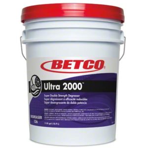 A 5-gallon white bucket with a red lid labeled "BETCO ULTRA 2000 DBL STRENGTH BUTYL DEGREASER.