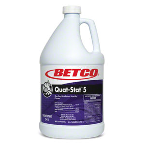 A large white jug of BETCO Quat-Stat 5 Disinfectant Cleaner, featuring a purple label with "Lavender" and a white cap. The label includes usage instructions and safety warnings.