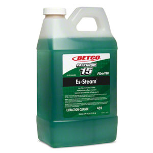 A green plastic jug labeled "BETCO FASTDRAW #15 FIBERPROES-STEAM LOW FOAM EXTRACTION" contains carpet extraction cleaner.