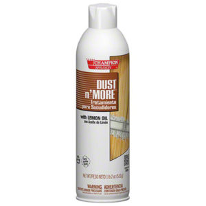 A 510g white aerosol can of DUST N' MORE LEMON DUST MOP TREATMENT, used for dust treatment. The can displays text in both English and Spanish, highlighting its cleaning properties.