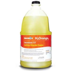 A large bottle of ENVIROX 117 H2ORANGE2 CONCENTRATE, a yellow liquid sanitizer and virucide cleaner.