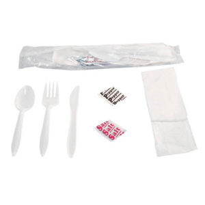 A PRE PACKAGED CUTLERY KIT includes a plastic fork, knife, and spoon, along with salt and pepper packets, a napkin, and a moist towelette, all partially wrapped in plastic packaging.