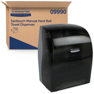 A smoke-colored "DISP ROLL TWL PULL N CUTAUTOMATICALLY DISPENSES" paper towel dispenser and its cardboard packaging box labeled accordingly.