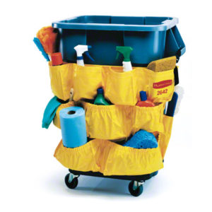 A RUBBERMAID BRUTE CADDY BAG in yellow, designed to fit 32-44 gallon containers, organized around a gray container on wheels and stocked with various supplies including spray bottles, a roll of paper towels, sponges, and cleaning cloths.