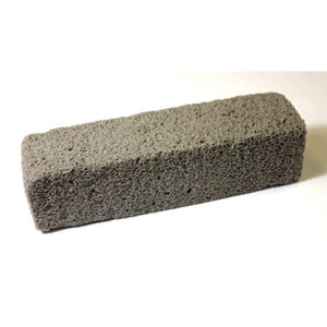 A rectangular gray FUR REMOVER BLOCKMAGNA ROCK LINT/HAIR RMVR with a rough, porous texture, commonly used for cleaning or exfoliating skin.