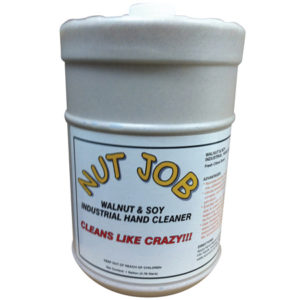 A large, gray container labeled "NUT JOB WALNUT, SOY, ALOE CITRUS INDUSTRIAL HAND CLNR" containing walnut and soy industrial hand cleaner with aloe and a citrus scent, featuring the phrase "Cleans Like Crazy!!!" printed on the front.