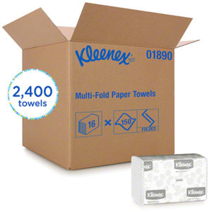 A large cardboard box labeled "MULTI FOLD TOWEL WHITE 1PLYKLEENEX 150/PACK 16/PACKS/CASE" alongside an image of a stack of the folded paper towels. The box indicates it contains 2,400 towels, packaged as 16 packs of 150 towels each.