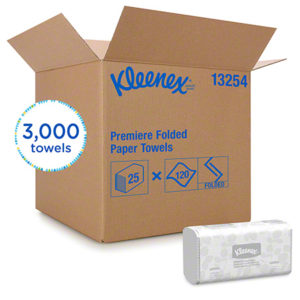 A large brown box labeled "Kleenex" contains 25 packs of Kleenex Scottfold Hand Towels, each pack holding 120 towels, amounting to a total of 3,000 towels. An individual pack of the Scottfold hand towels is displayed in front of the box.