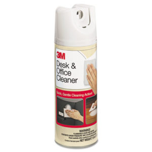 A 15oz aerosol spray can of 3M Desk & Office Spray Cleaner, featuring images of hands wiping a desk and a keyboard. The label highlights "Quick, Gentle Cleaning Action!" and provides a warning about flammable contents. Each carton contains 12 cans.