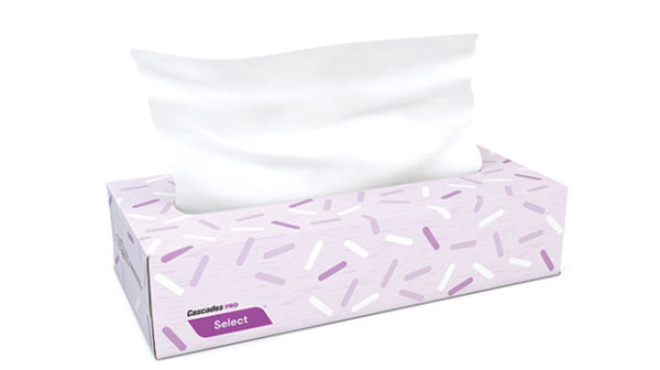 A rectangular tissue box with a lavender and white design is shown. One tissue is partially pulled out from the top. The box has "F950 Select Flat Box Facial Tissue, 2-Ply, White, 100 Sheets/Box" written on the side.